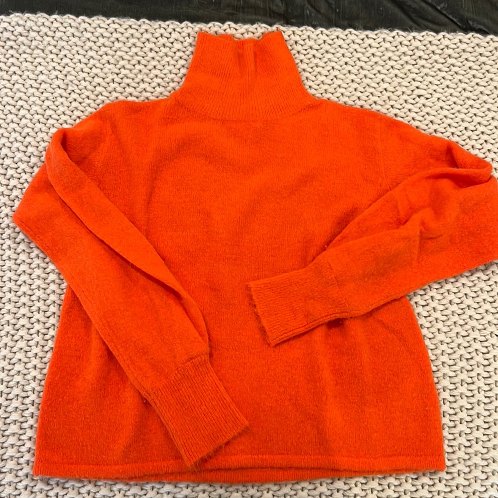 Orange turtleneck